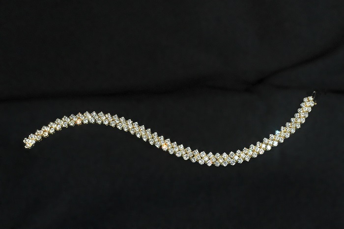 Three row flexible bracelet with round cut diamonds
