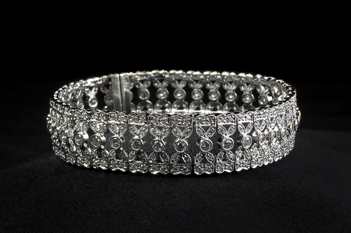 Vintage style wide diamond bracelet with round cut diamonds