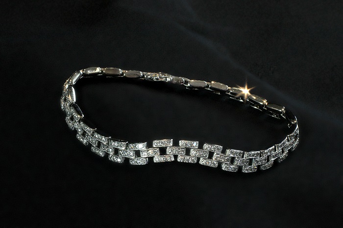 Three row pave set bracelet with round cut diamonds