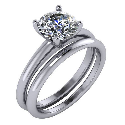 Solitaire engagement ring with round cut diamond and matching plain wedding band