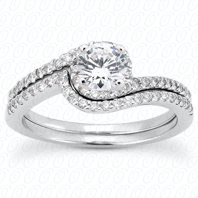 Contemporary swirl style engagement ring with round cut center and side diamonds, paired with matching diamond wedding band