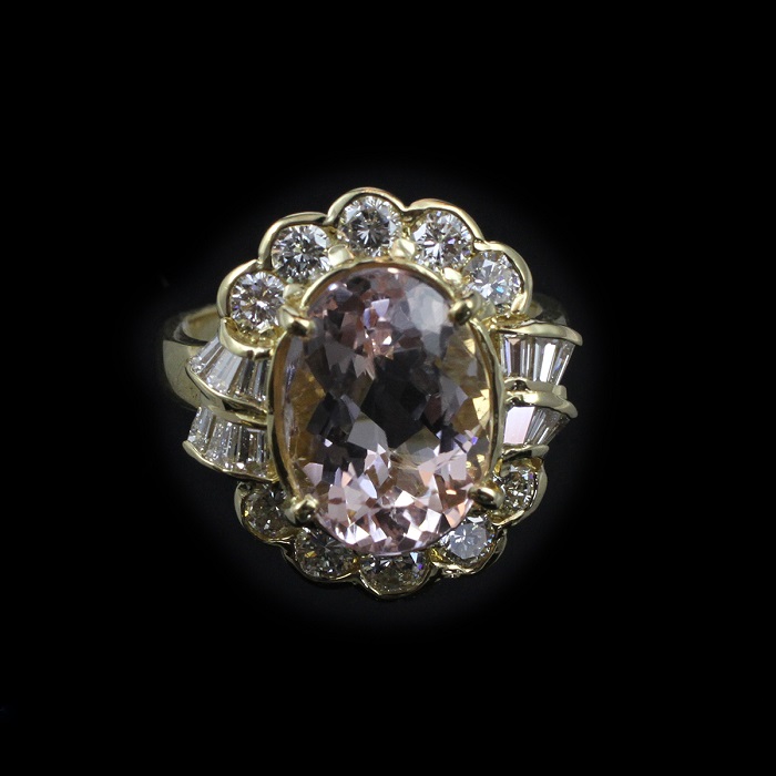 Oval shape morganite ring with round and baguette cut diamonds