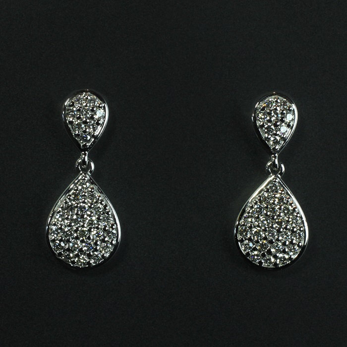 Tear drop dangle style earrings with round cut diamonds