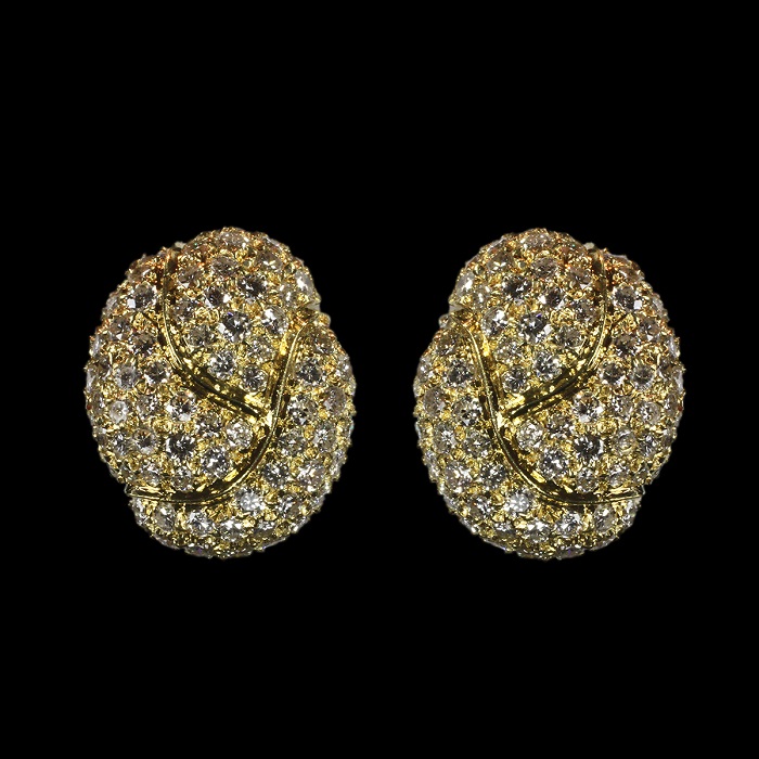 Button style earrings with pave set round cut diamonds