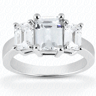 Three stone emerald cut diamond engagement ring