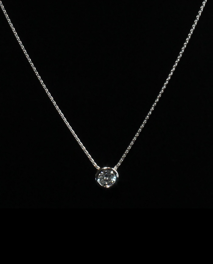 Solitaire bezel set round cut diamond pendant