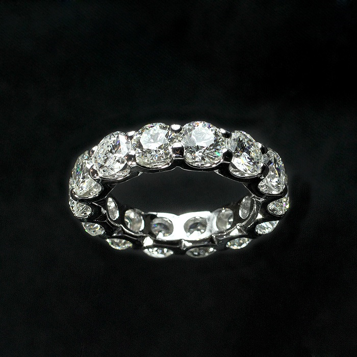 Prong style eternity band with round cut diamonds